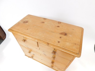 A Victorian stripped pine chest, of two short and three long drawers, with knob handles, on turned feet, 98cm high, 96cm wide, 48cm deep. (AF) - 2