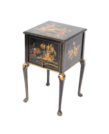 An Eastern lacquer sewing box, with relief moulded decoration of figures, bridges and trees, with cabriole legs, 60cm high, 35cm wide, 34cm deep.
