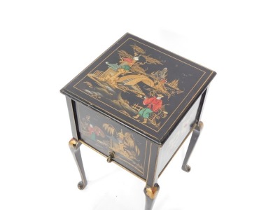 An Eastern lacquer sewing box, with relief moulded decoration of figures, bridges and trees, with cabriole legs, 60cm high, 35cm wide, 34cm deep. - 2