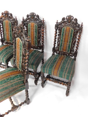 A set of four 19thC carved oak hall chairs, each with crest and lion top, on green striped material base, on barley twist supports, 115cm high. - 3