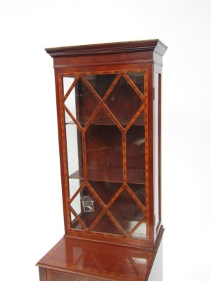 A Georgian mahogany and inlaid display cabinet, with moulded cornice top, with rosewood banded astragal door, two shelves, with marquetry cupboard and single drawer base, on dart moulded legs, 163cm high, 47cm wide, 48cm deep. - 2