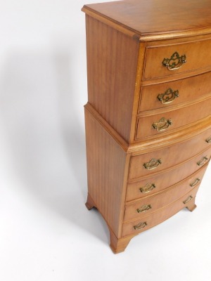 A reproduction walnut chest on chest, with arrangement of three over four drawers, with brass handles, on out splayed bracket feet, 108cm high, 52cm wide, 34cm deep. - 3