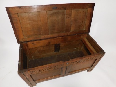 A 17thC carved oak coffer, with two panels top and front, Arabesque frieze, on stiles, 56cm high, 115cm wide, 46cm deep. - 3