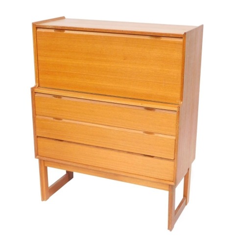 A teak mid century cocktail cabinet, the fall top above arrangement of three drawers, on shaped stiles, 114cm high, 91cm wide, 41cm deep.