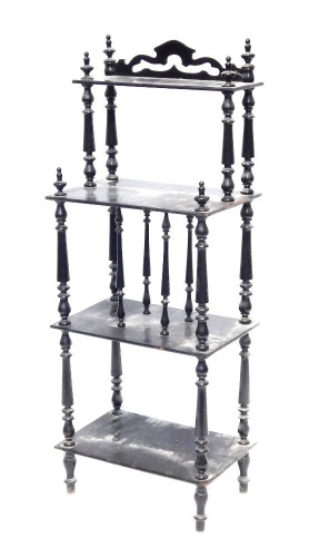 A Victorian ebonised whatnot, with taper turned supports, 130cm high, 48cm wide, 31cm deep.