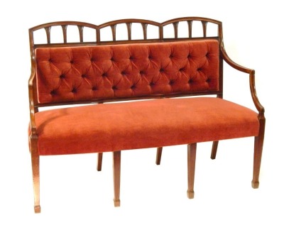 A late 19thC triple sofa in the George III style, with carved and fluted back, on square taper splayed legs, 95cm high, 125cm wide, 53cm deep.