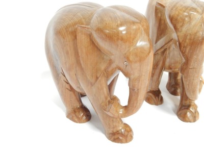 Two carved wooden elephant figures, each 38cm high. - 2