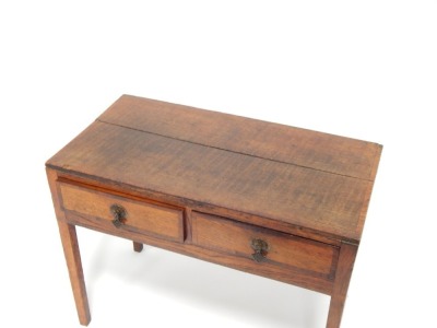 A 19thC oak side table, with parquetry banded detail, later replacement handles, on tapered legs, possibly shortened, 62cm high, 80cm wide, 41cm deep. - 2