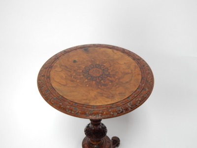 A Victorian walnut occasional table, with carved and inlaid top, on tripod carved base, with acanthus carved knees, 74cm high, 50cm diameter. - 2