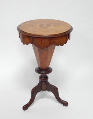 A Victorian walnut trumpet sewing table, the circular top with parquetry inlaid of birds, and ring banding, with shaped and moulded supports on a mahogany tripod base, 70cm high, 43cm diameter. - 2