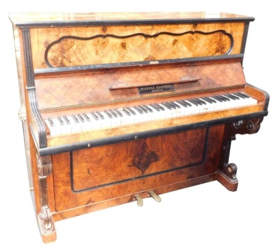 A Victorian walnut cased upright piano, retailed by Hildred Bros of Boston