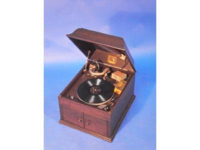 A HMV oak cased wind up gramophone player