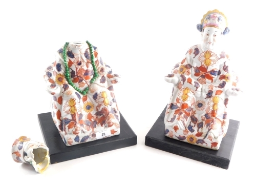 A pair of 20thC Chinese Imari Imperial style figures, in floral robes, predominantly in orange and blue, 29cm high. (2, AF)