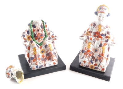 A pair of 20thC Chinese Imari Imperial style figures, in floral robes, predominantly in orange and blue, 29cm high. (2, AF)