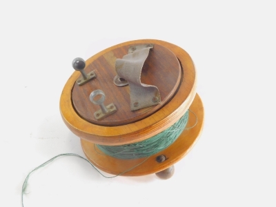 A large oak cased sea fishing reel, with metal and wooden mounts, 26cm diameter. - 2