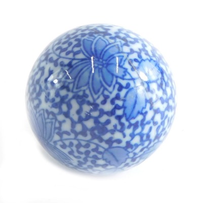 A 20thC blue and white carpet bowl, decorated with flowers, 5cm diameter.