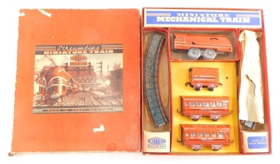 A Mettoy Railways streamline miniature tin plate train set, boxed.