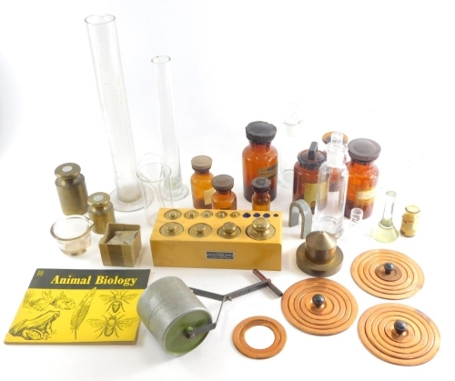 Various pharmaceutical bottles, brass weights, coloured glass and other pharmaceutical bottles, 18cm high, etc. (a quantity)