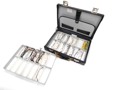 Various optical equipment, and a case containing various spectacles with Guichard label. (1 case)