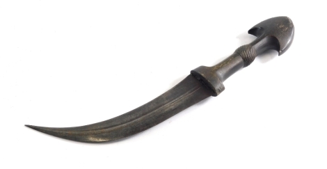 An Eastern dagger, with mitre shaped handle and curved blade, 31cm long.