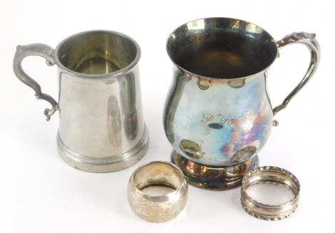 A silver napkin ring, of plain circular form, pewter tankard, silver plated tankard, 13cm high, and a further napkin ring, various dates and marks. (4)