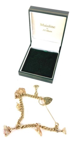 A 9ct gold charm bracelet, with heart shaped clasp, a number of various charm seals, fob 2cm high etc, 40g all in.