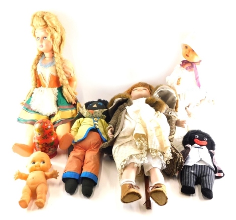 Various dolls, to include mid 20thC Celluloid and others, plastic doll with articulated limbs 60cm high, various other cloth dolls etc. (quantity)