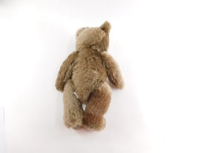 A modern Steiff Teddy bear, in brown with articulated limbs and button to the ear 38cm high. - 2