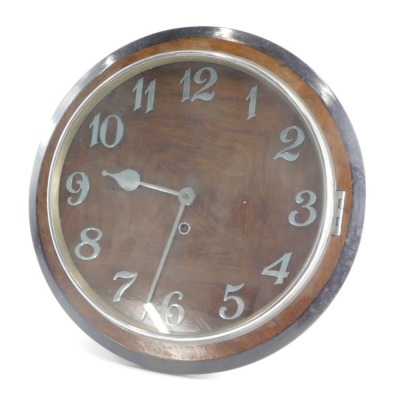 A mid-20thC Art Deco wall clock, 37cm diameter dial with chrome Arabic numerals, oak finished and ebonised case with key 38cm diameter.