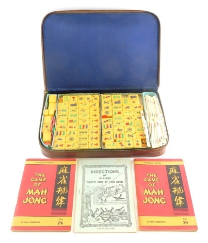 A late 20thC mahjong set, with resin tiles in case 33cm wide.