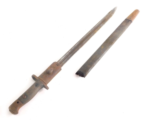 A 20thC bayonet, with leather scabbard and a turned wooden and metal grip 54cm long.