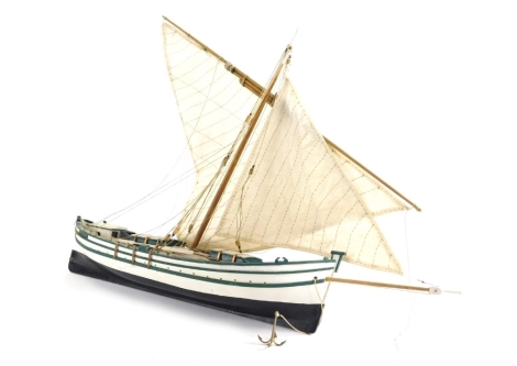 A 20thC wooden model of the St Lucia boat, with realistic deck and rigging, 48cm wide