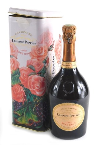 A bottle of Laurent-Perrier Rose Cuvee, in tin.