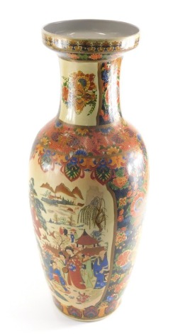 A Japanese pottery floor standing vase, with trumpet stem, transfer printed with many figures of Geisha before mountains, with other panels of flowers, unmarked, 63cm high.