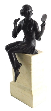 An Art Deco bronze and marble figure, of a girl seated on a wall holding mirror, unsigned, 37cm high.