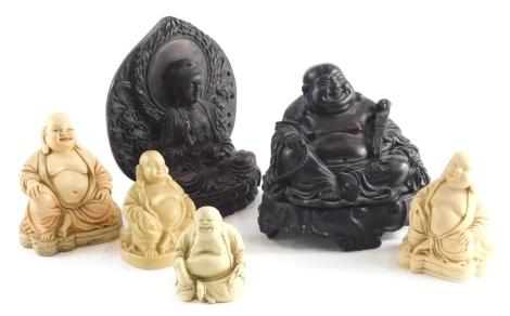 A resin figure of Buddha, seated with smiling expression, 18cm high, an Indian God and four various other Buddha figures. (a quantity)