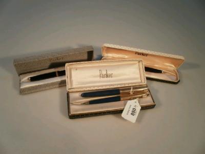 Three cased Parker pens