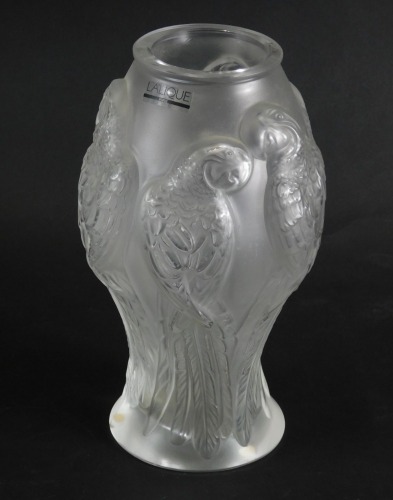 A Lalique glass parrot vase, 28cm high.