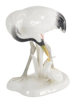 A Noritake figure of a crane and young, marked beneath, 19cm high.