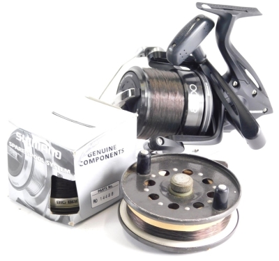 Three fixed spool fly fishing reels, comprising a pair of Okuma L5