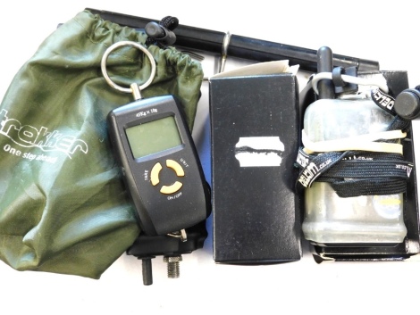 Three Delkimtx-iplus electronic bike alarms, with original boxes and the remote radio pick up and a set of Trakker digital scales.