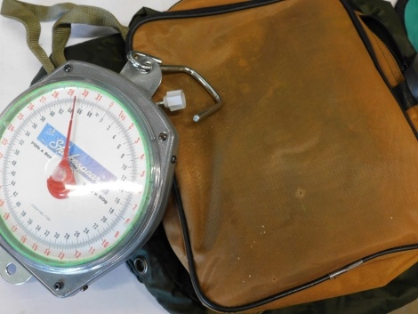 A set of Shakespeare fishing scales, 70lb x 2oz (32KGx50g), with carry case and weigh sling.