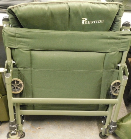 A Prestige folding fishing seat.