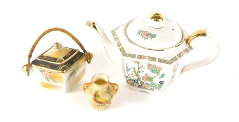 A Locke and Co Worcester small two handled vase, decorated with a pheasant, a Japanese porcelain preserve jar and cover, and a Sadler Indian Tree pattern teapot. (3)