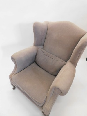 A mahogany wingback chair, George III style, upholstered in grey fabric on cabriole legs with pad feet. - 2