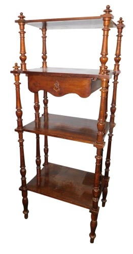 An unusual continental walnut four tier whatnot, with central frieze drawer on turned supports, 46cm deep.