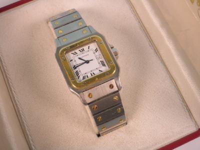 A bi-colour mid-size wristwatch
