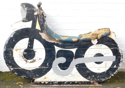 A fairground ride wooden motorcycle, marked IC.18, painted in white and black, on metal framed base with metal handles, various coloured leather studded seat, 94cm high, 112cm wide, 40cm deep. (AF) - 2