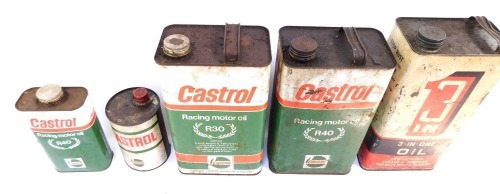 Five Castrol Racing motor oil canisters, comprising three large rectangular canisters, 30cm high, a smaller example, 18cm high, and a cylindrical example, 15cm high. (5)