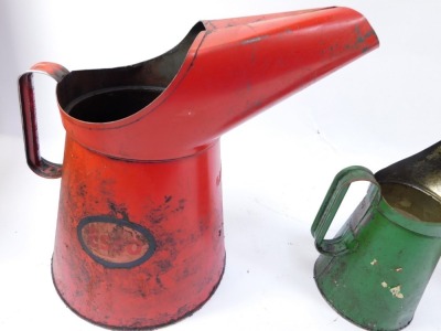 Three Esso oil cans, comprising two red oil cans stamped Esso, 31cm and 26cm high, and a green quart Esso jug, 28cm high. (3) - 2